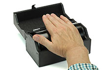 The palmprint ink roll shown in use.
