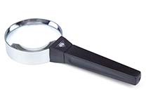 Hand-held glass-lens magnifier, diameter 75 mm, one lens, magnification about 3,5X