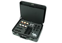 UV-kit with opened kit containing powders and pastes